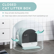 Enclosed cat litter box with lid, tray, and scoop designed for privacy and odor control in a modern bathroom setting.